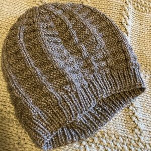 Hand knitted beanie /winter hat. Never worn and brand new! Super cozy